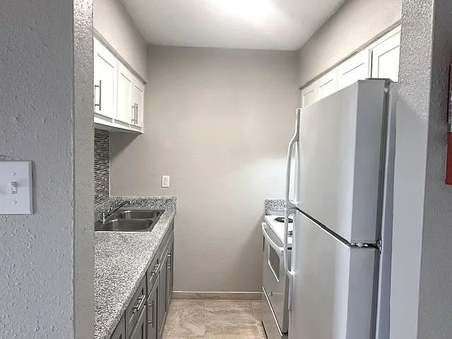 Encanto Apartments — Photo 21