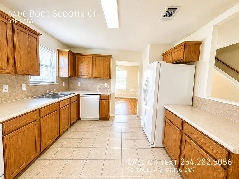 5406 Boot Scootin Ct — Photo 7