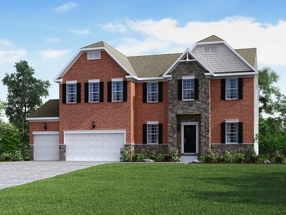 Elevation B New England Partial Brick and Stone with 3 Car Garage