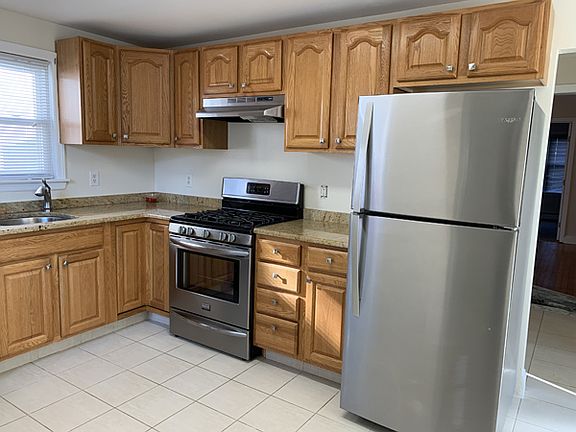 Kitchen. Lots of storage, full sized SS appliances.