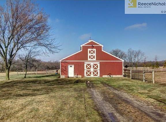 Barn is located in back of home.