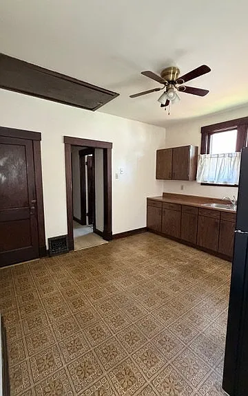 Kitchen upon entering home from the backdoor.