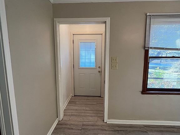 Entry off of the front porch, leading into the dining area