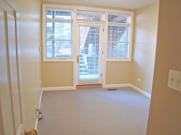 Bedroom #2 with access to back patio