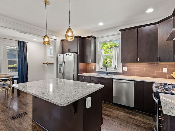 Large open kitchen with another dining table