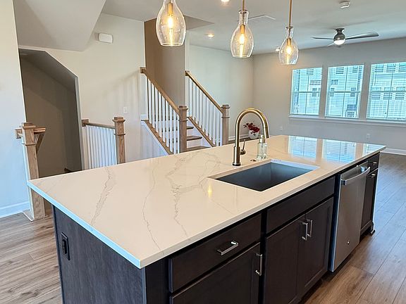 Large quartz island with seating _ perfect for entertaining.