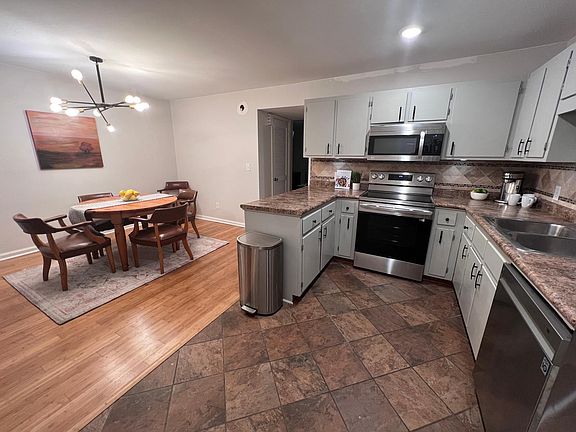 Spacious kitchen/DR with brand new stainless steel appliances