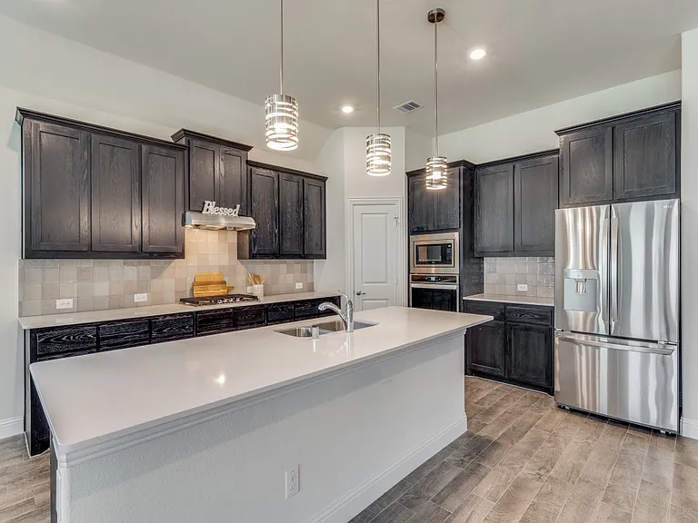 Kitchen with stainless steel appliances