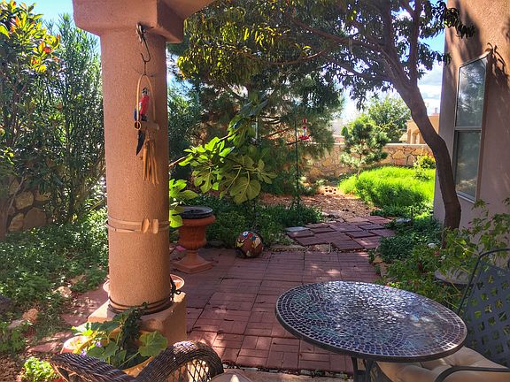 Lush patio with sunset views