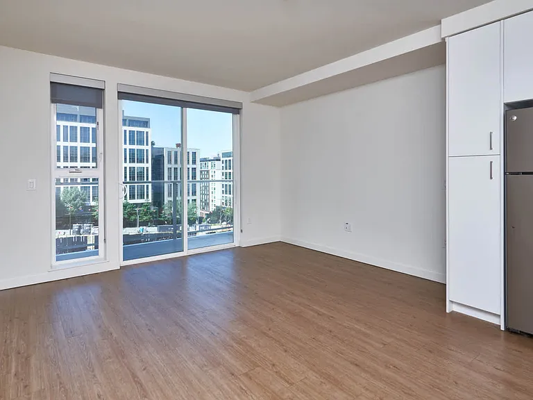 Studio with Balcony and Hard Surface Flooring