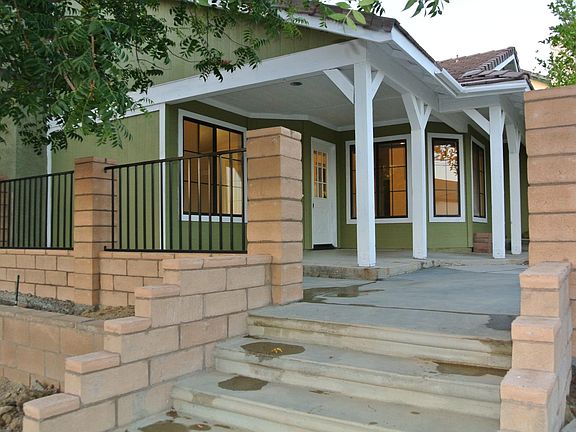 Corner Lot. Streetside stairs leadingto the front porch