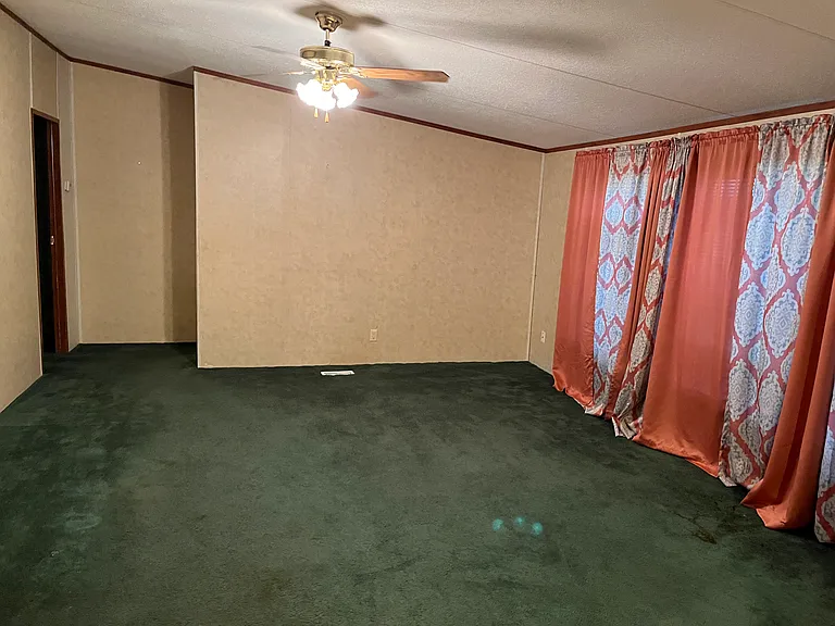The back living room with large windows!