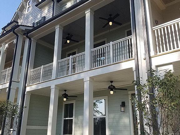 Comfortable outdoor living area with fans and great view of pond. Set back from Alpha Loop walkway with a lot of privacy