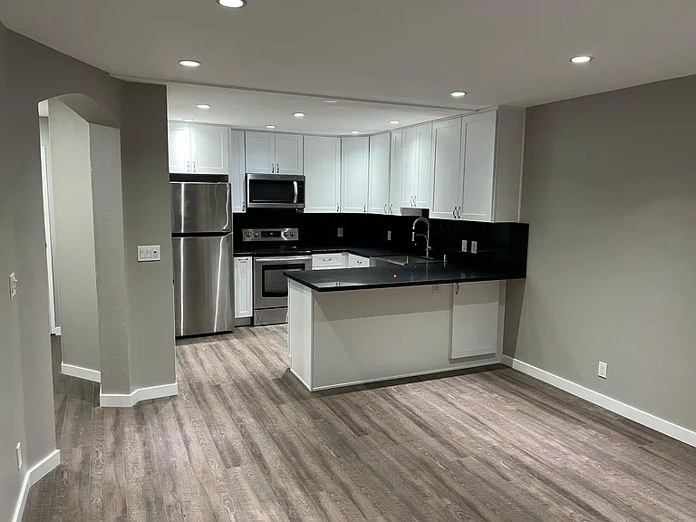 6815 Remmet Ave #211 — Photo 1