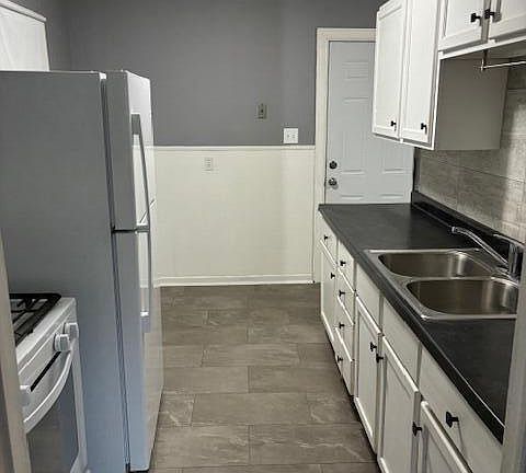 5th image of 1209 W 63rd Ave