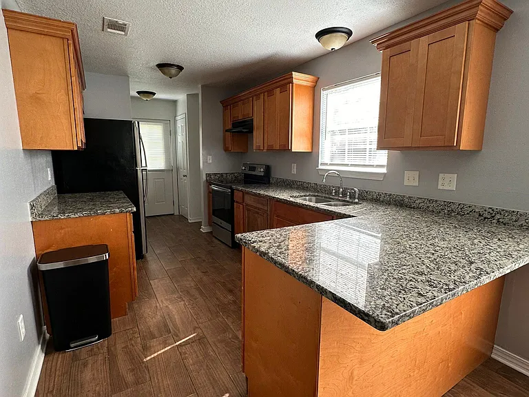 Stone counter tops, Refrigerator and Stove/ Oven