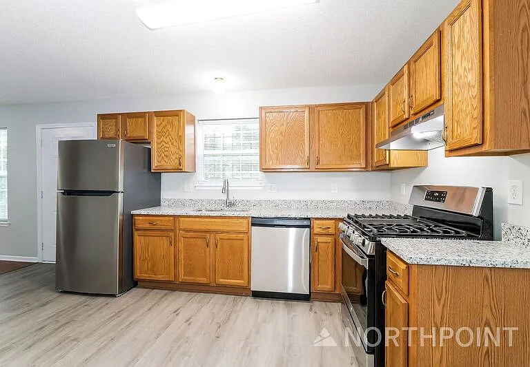 4211 Woodland Ave — Photo 2