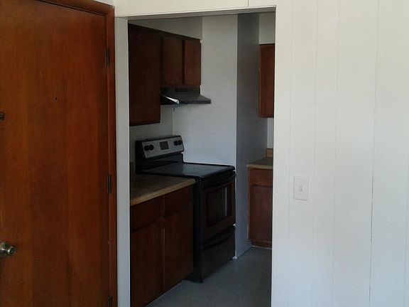 Front door and entrance to kitchen