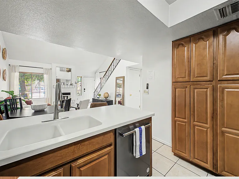 Kitchen's built-in pantry offers tons of storage for multiple people