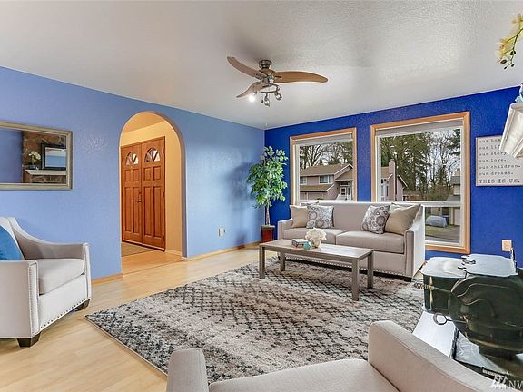 Delight in stunning territorial views of the manicured fully fenced yard, including a darling garden shed /play house. The spacious lower level of this home invites the possibility of a private Mother-in-law apartment, guest suite or family/rec room. This space is plumbed for a kitchen and offers a separate entrance. Victoria Park is a lovely, established neighborhood with easy access to freeways, SeaTac airport, hospital, major retail, Sound Transit, dining and business hubs.
