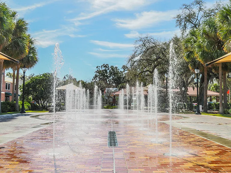 The Downtown Splash Pad is a favorite for kids, just steps from our community.