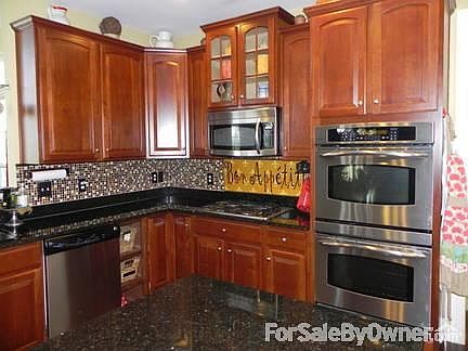 Gourmet Kitchen
						:
						Upgraded stainless steal appliances. Upper wall oven is a convection oven.