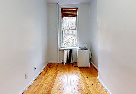 4th image of 123 E 7th St APT 3E