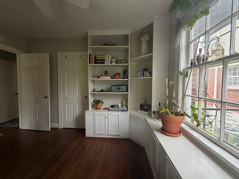 Downstairs Bedroom with Built-in Bookshelves