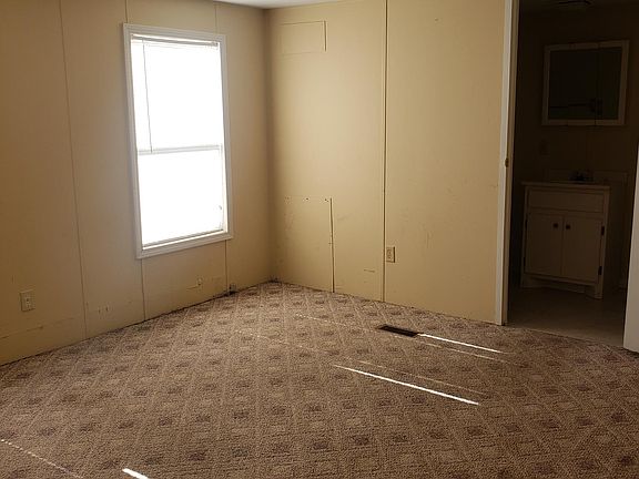 Master bedroom looking into master bathroom