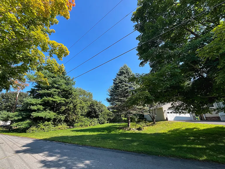 View from side of the property showing large yard