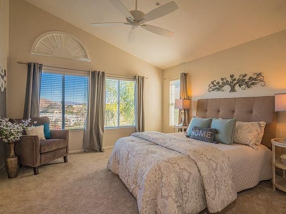 Master bedroom has good light and scenic views across Rancho