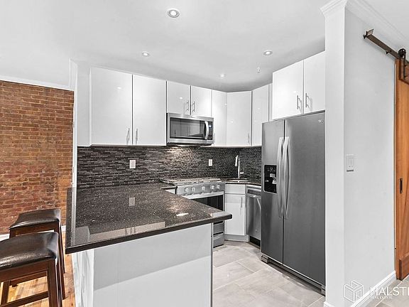 3rd image of 410 W 23rd St APT 2F