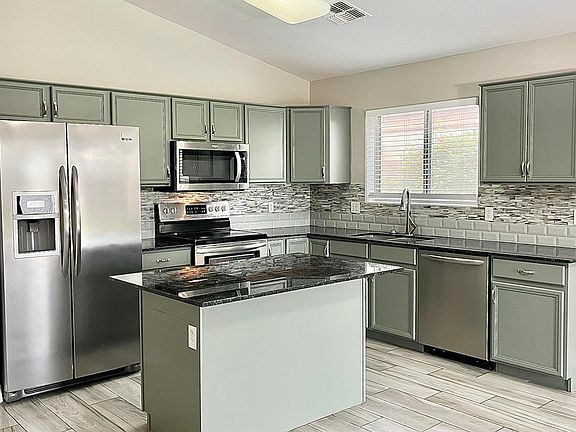 5th image of 9041 E ELMWOOD Street