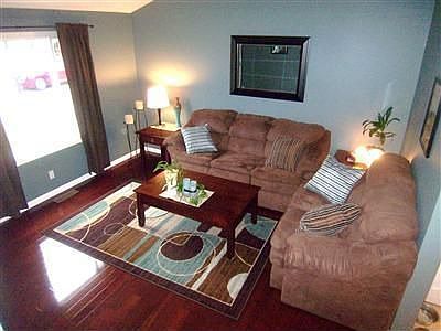 This large great room boasts cathedral elements and architectural detail