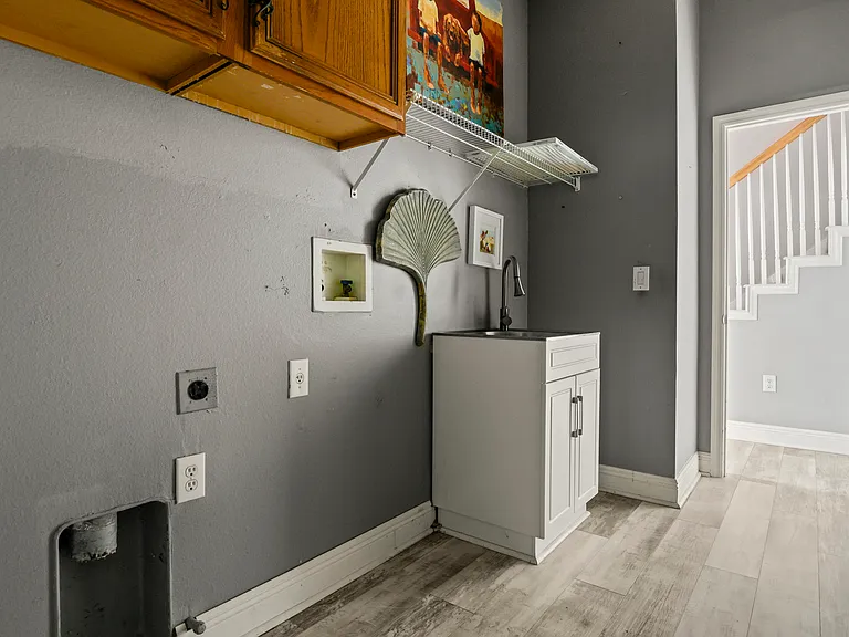 Laundry - mud room / drop zone between garage and main house and convenient to 2 bedrooms and kitchen. Create a drop zone for all that gear and clothes and electronics.