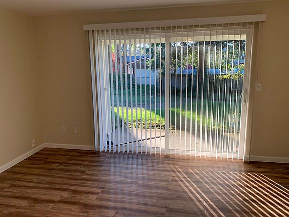 Livingroom with view of back yard and patio