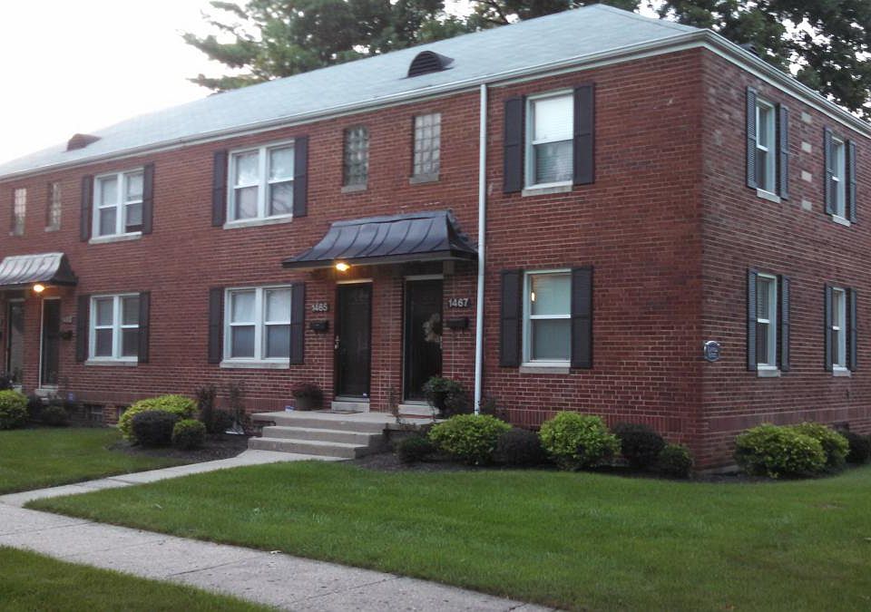 Exterior of building. Corner unit with lots of natural ligh