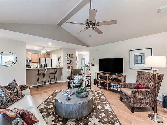 View toward the kitchen, and the entry to the home is on the right.