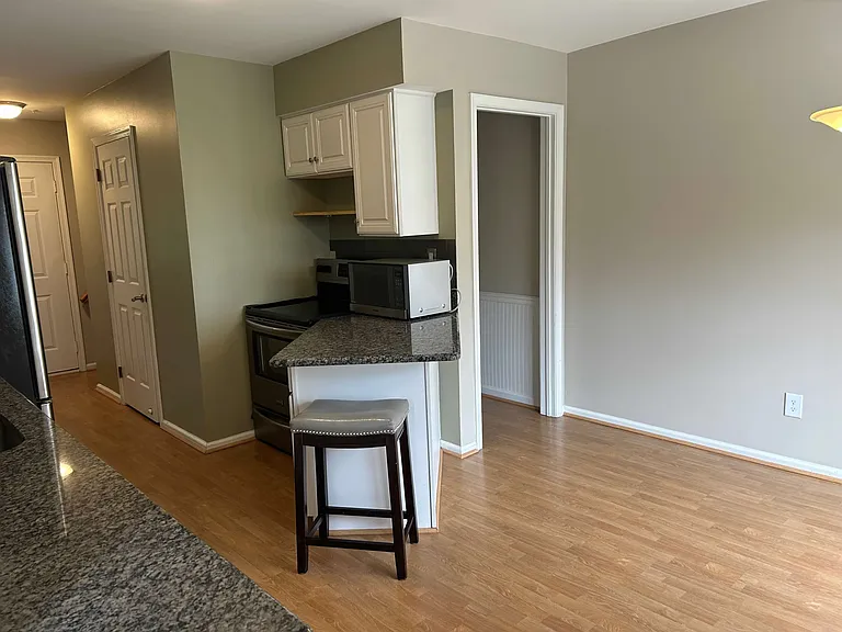 Kitchen island and access to basement