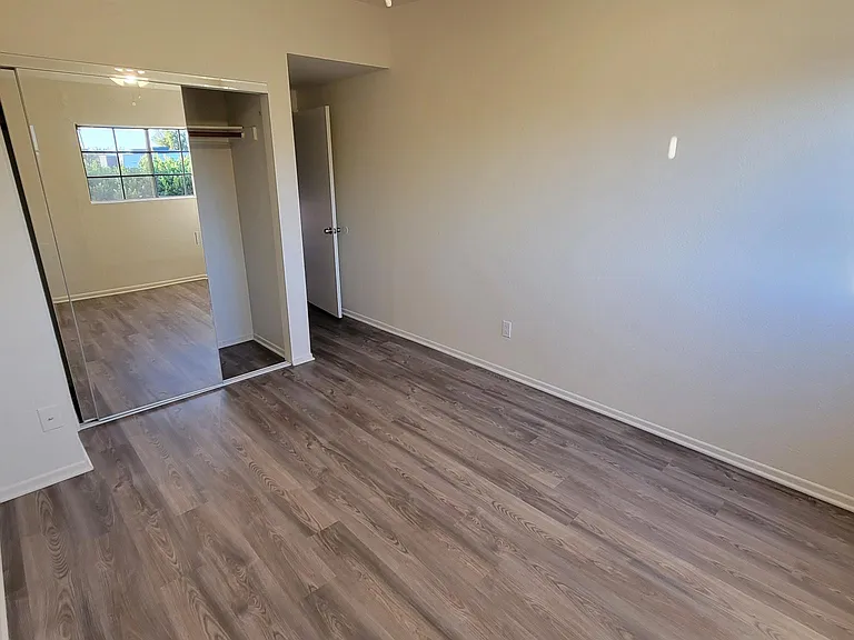Bedroom #2 & mirrored closet doors
