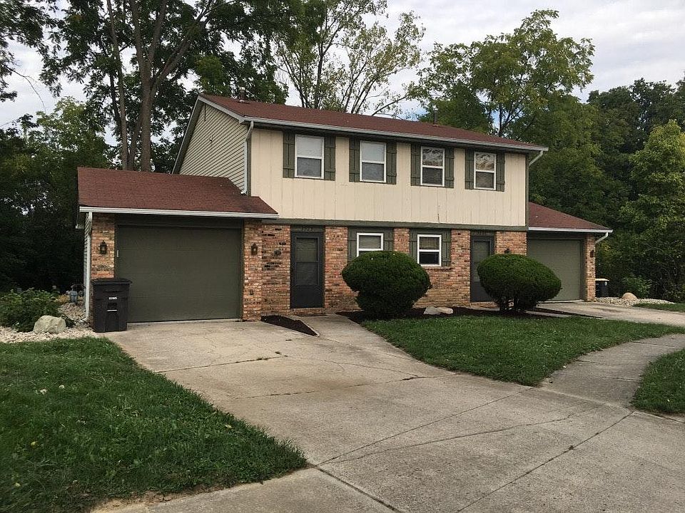 Exterior of townhouse. Unit is on the left.