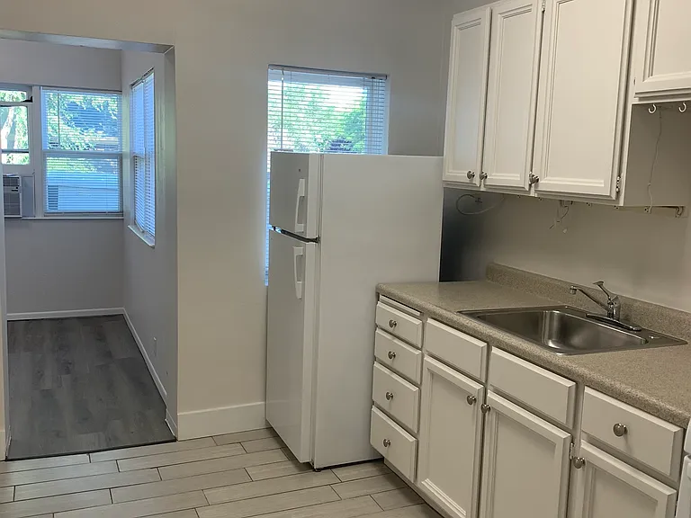 Kitchen, with bedroom entry