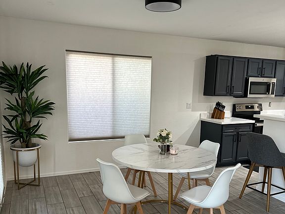 Breakfast table with 4 chairs.