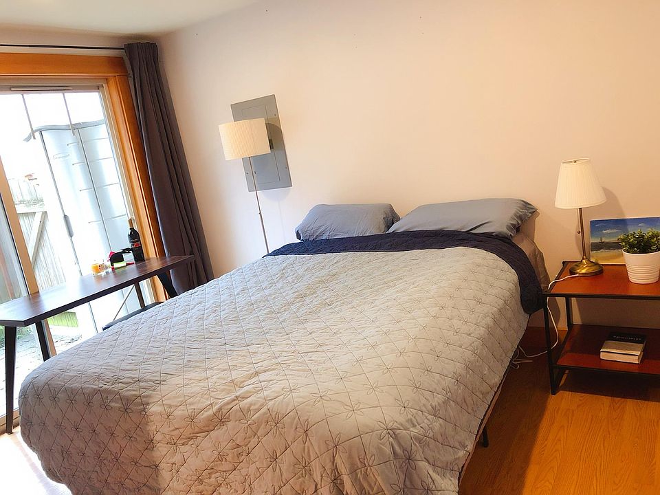 1st floor - bedroom (queen size bed in the picture) patio window facing to the east