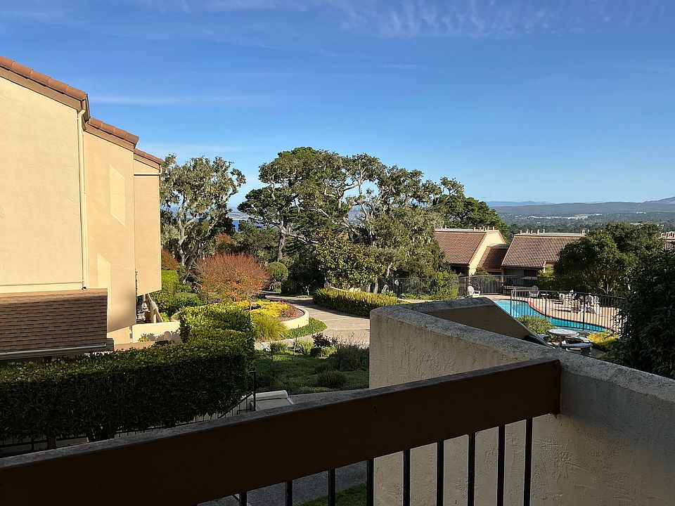 View from large balcony (swimming pool and cabana below). BBQ grills available near cabana/swimming pool.