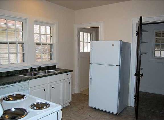 11x9 kitchen with new vinyl floor, large walk-in pantry and all appliances are