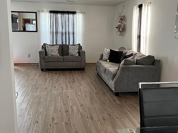 Dining to Living Room: Sample furnishings and updates in progress to flooring