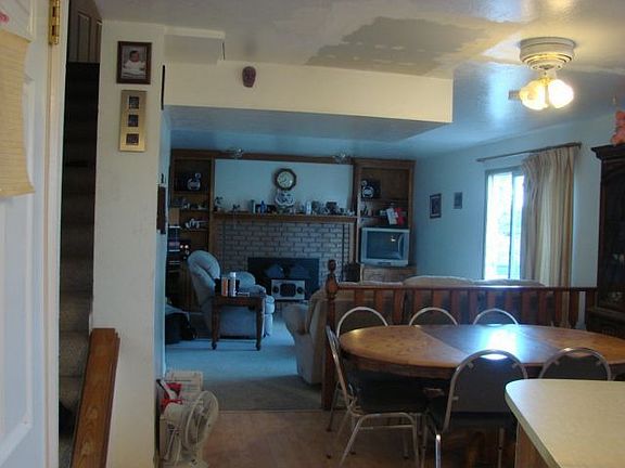 dinning room and front room with fire place