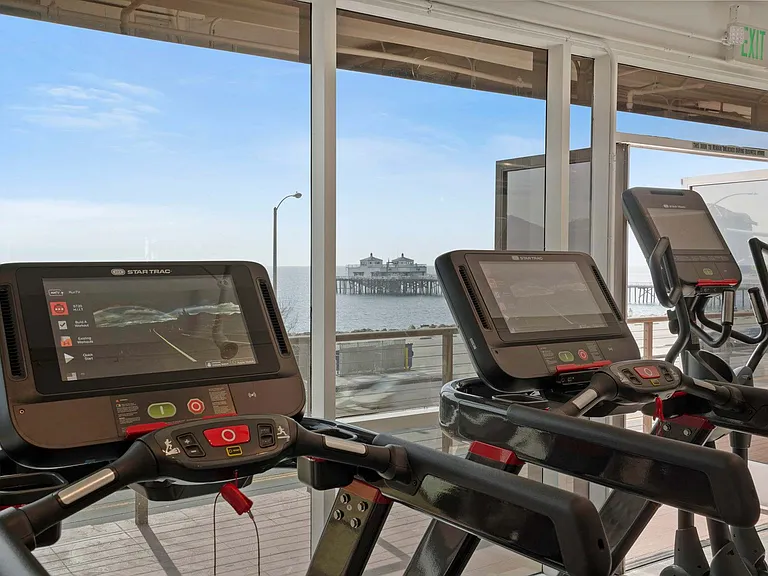 Elevate your workouts at CURE Spa, where luxury fitness meets stunning coastal views just minutes away.