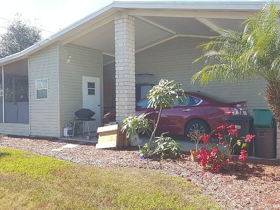carport with storage shed
